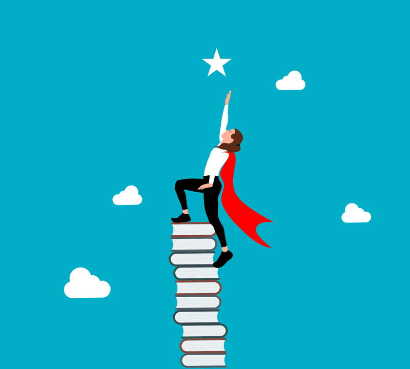 A woman is standing on top of a stack of books and reaching for a star.