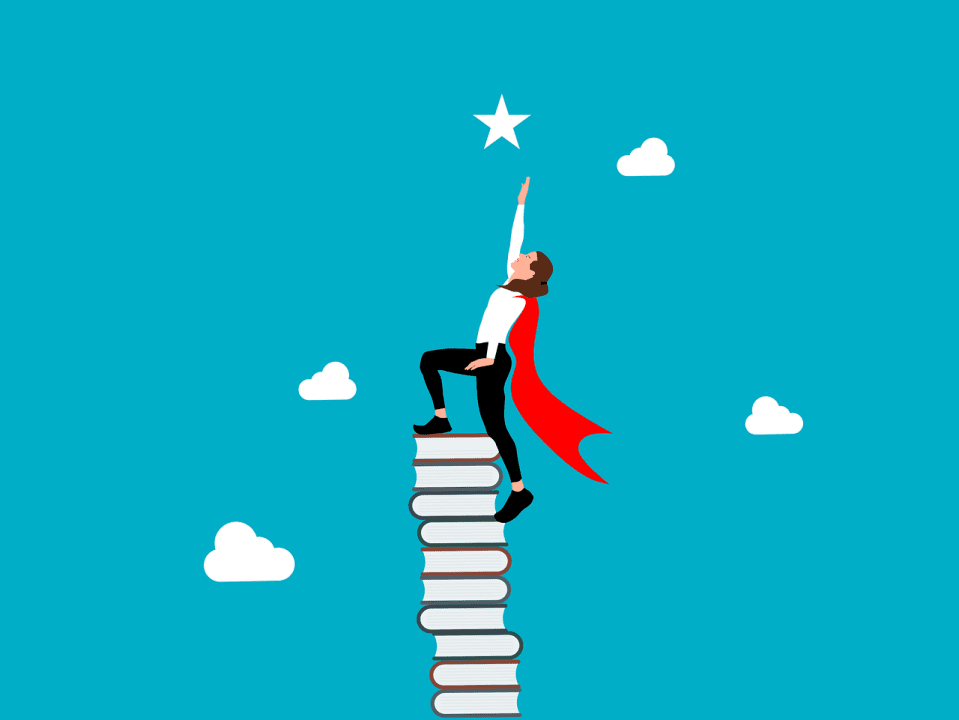 A woman is standing on top of a stack of books and reaching for a star.